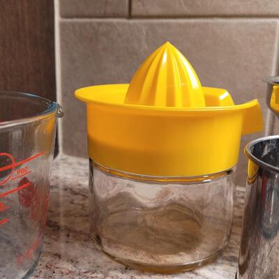 Lot 3: Measuring Cups, Sifter, Funnel and Juicer 