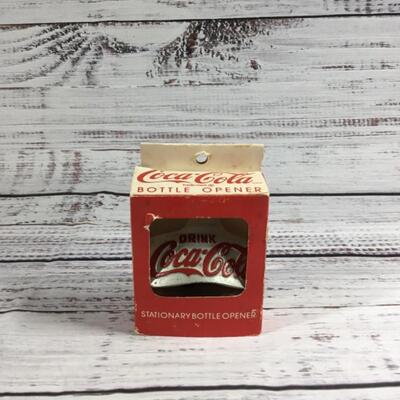 Coca-Cola brand Stationary Mounted Bottle opener