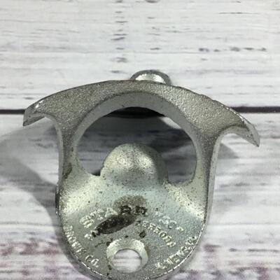 Coca-Cola brand Stationary Mounted Bottle opener