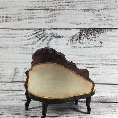 Floral antique couch with two bears figurines