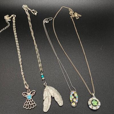 Set of 4 Silvertone Fashion Charm Pendant Necklaces