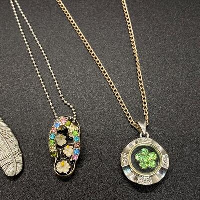 Set of 4 Silvertone Fashion Charm Pendant Necklaces
