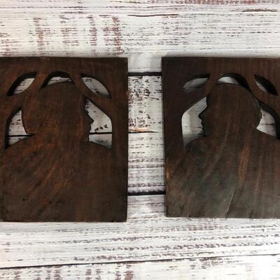 Man and woman Native Indian heads carved wood busts pair