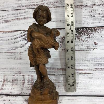 Boy and lamb wood carved figurine