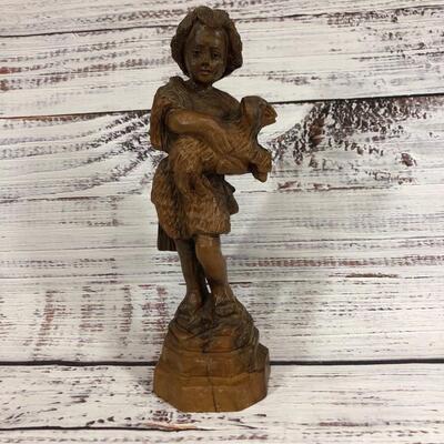 Boy and lamb wood carved figurine