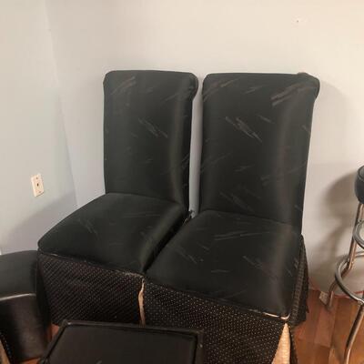 Four solid wood high back covered chairs