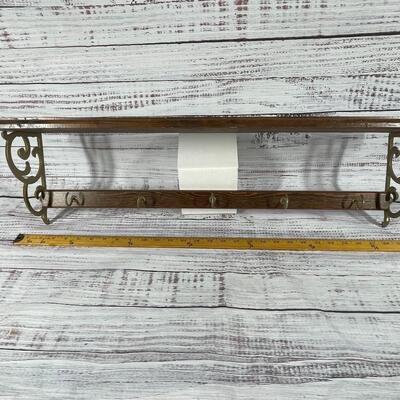 Teacup and Saucer display shelf with hooks and grooves for holding cups and saucers