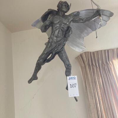 Winged silver man