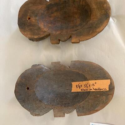 African carved faces