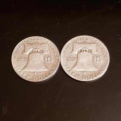 2 silver Franklin half dollars 
