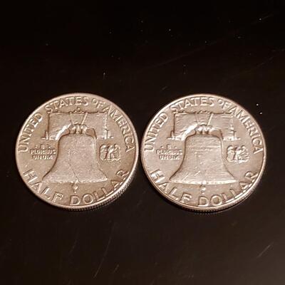 2 silver Franklin half dollars 