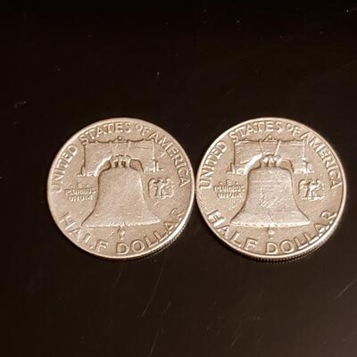2 silver Franklin half dollars 