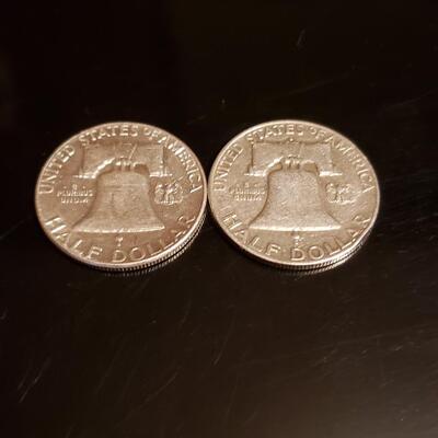 2 silver Franklin half dollars 