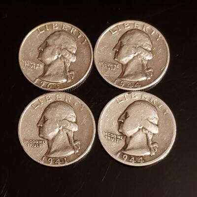 4 various date silver quaters 