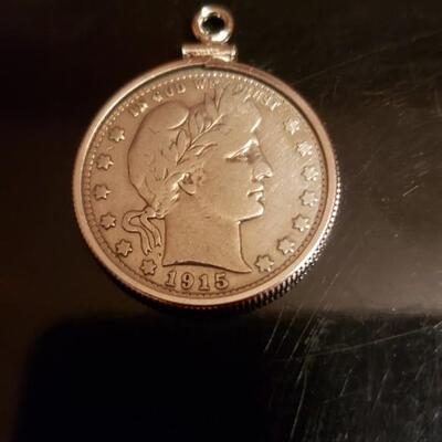 1915 barber silver quater in silver bezel 