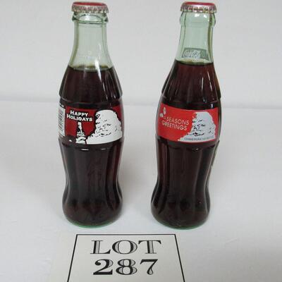 2 Different Vintage Coca Cola Christmas Bottles With Santa