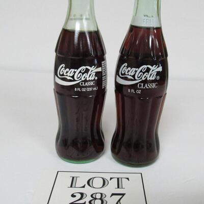 2 Different Vintage Coca Cola Christmas Bottles With Santa