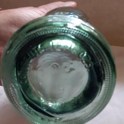 Lot 35 - Tilted Glass Soda Bottle