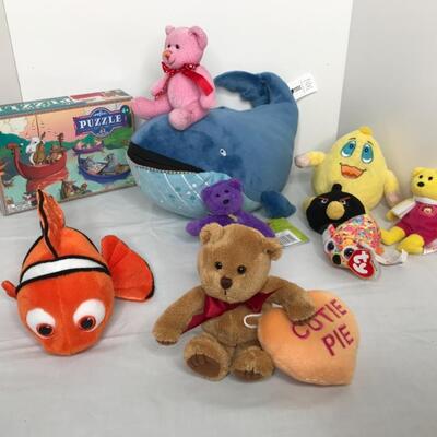 Stuffed animals and puzzle