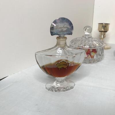 Candle holders, marbles, shalimar, daisy cologne, saucer creamer