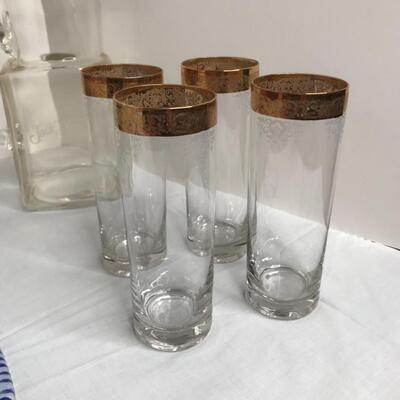 Clock, 3 pitchers, 4 hi ball glasses, Welcome sign