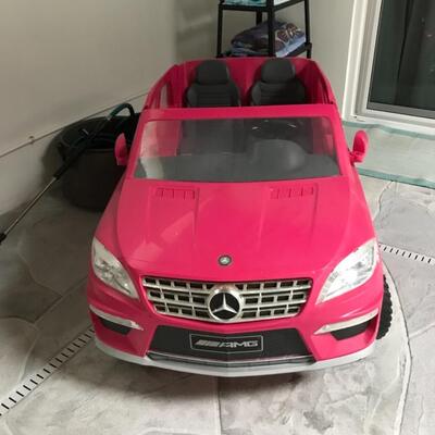 Pink electric kids car