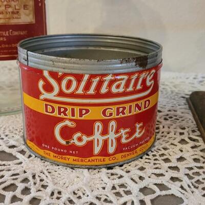 Lot 163: Antique Coffee Grinder, Solitaire Coffee Tin and Fruit & Sugar Pineapple Glass Jar