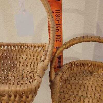 Lot 247: (2) Raffia Baskets and (1) Large Basket with Leather Handles