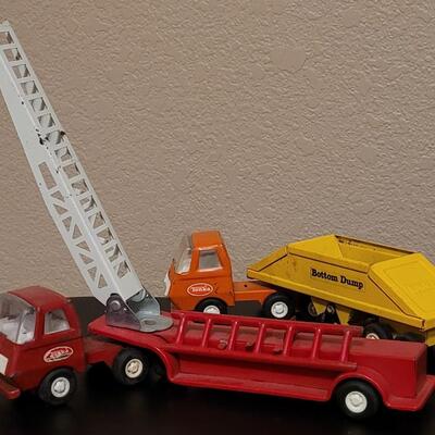 Lot 268: Vintage Tonka Mini Trucks and Trailers (2)