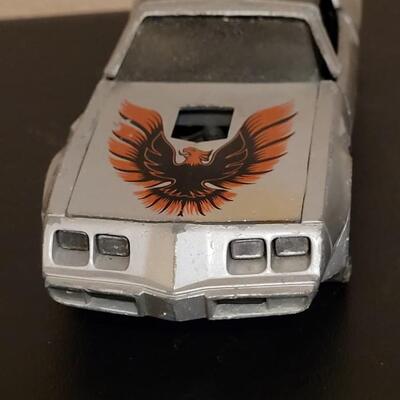 Lot 270: Vintage Yatmina Trans Am, Small Tonka Dump Truck and Matchbox Truck