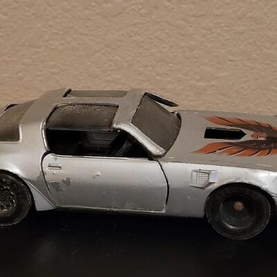 Lot 270: Vintage Yatmina Trans Am, Small Tonka Dump Truck and Matchbox Truck