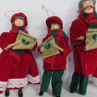 4 Plastic and Cloth Christmas Carolers
