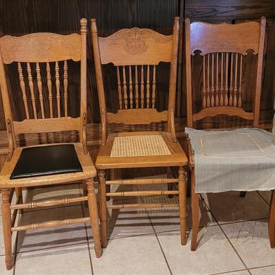 Lot 104: (3) Medium/Light Oak Chairs (one needs repair)