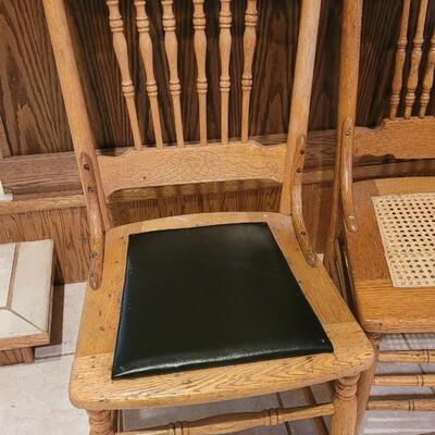 Lot 104: (3) Medium/Light Oak Chairs (one needs repair)