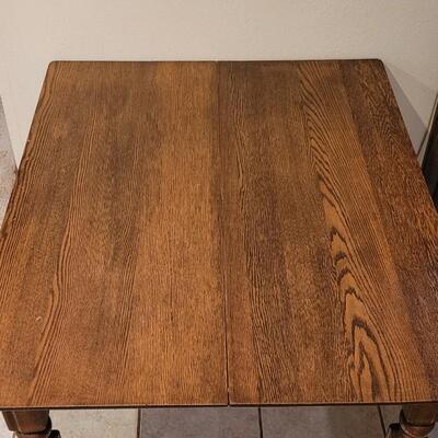 Lot 110: Antique 5 Leg Oak Table with 3 Leaves and Storage Box