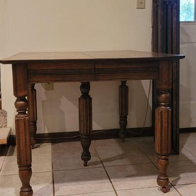 Lot 110: Antique 5 Leg Oak Table with 3 Leaves and Storage Box