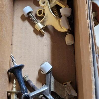 Lot 247: Door Stops and Electrical Plugs