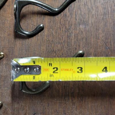 Lot 254: Vintage Brass Hooks Lot