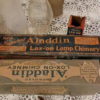 Lot 273: Large Lot of Kerosene Lamp Chimneys, Wicks and Other Parts