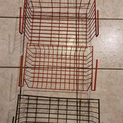 Lot 302: (3) Metal Under Shelf Baskets and (1) White Metal Riser