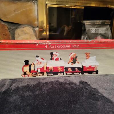 Artmark 4pc Porcelain Holiday Train | EstateSales.org