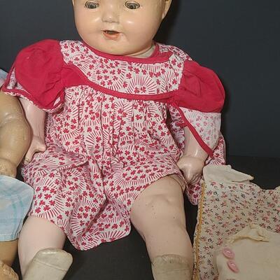 Lot 25: Vintage Dolls, Crocheted Purse, and Doll Clothes