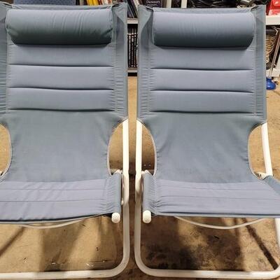 2 blue folding chairs