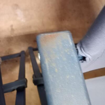 2 blue folding chairs