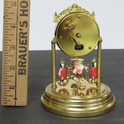 West German Wind Up Clock German Figures Spin, With Glass Dome