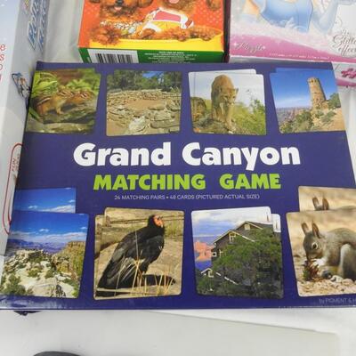 9 pc Puzzle and Game Lot: Taboo, Penguin Race, Grand Canyon Matching Game, etc