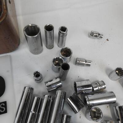 1951 Wizard Tool Box filled with 50 newer Craftsman and Cresent Sockets only.