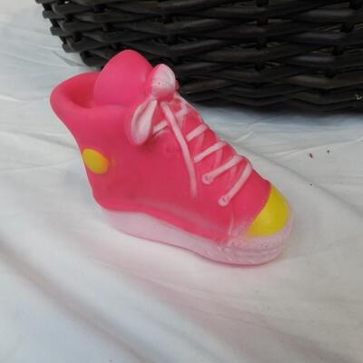 Large Basket Dog Bed, and a Pink Sneaker Squeaky Dog Toy
