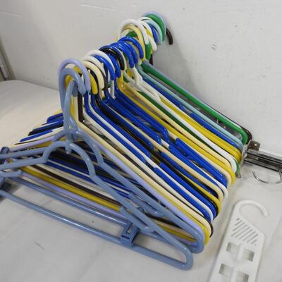 About 50 Plastic Hangers, Tie Hangers, Closet Hook Installation