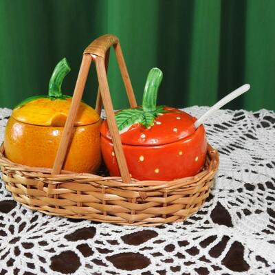 Strawberry and orange marmalade jelly jars